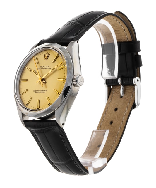 Rolex 1002 Leather Strap Rolex Oyster Perpetual Champagne Baton Dial